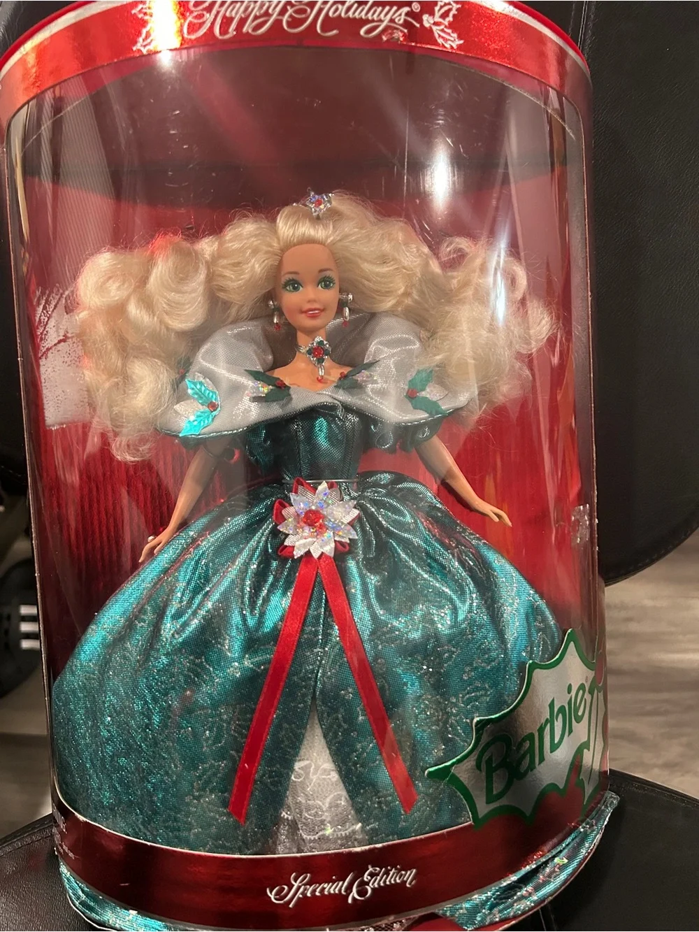 1995 Special Edition Happy Holidays Barbie by Mattel, featuring a distinct emera